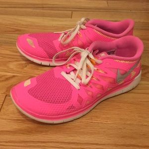Hot pink Nike Free 5.0
